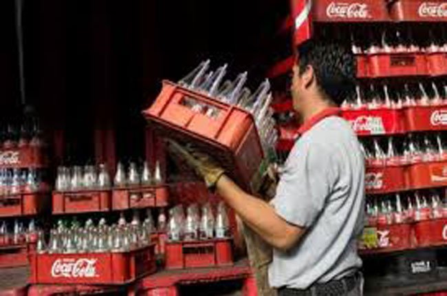 Coca-Cola giảm doanh thu và lợi nhuận