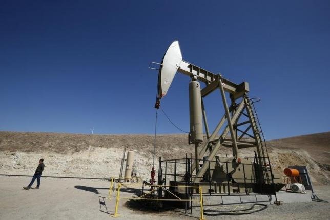 Giá dầu thấp, các cty dầu đá phiến Mỹ thu hẹp sản xuất