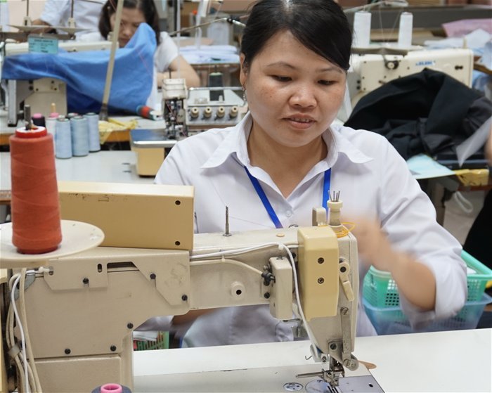 ILO: VN tuân thủ tốt chế độ lương tối thiểu trong ngành dệt may