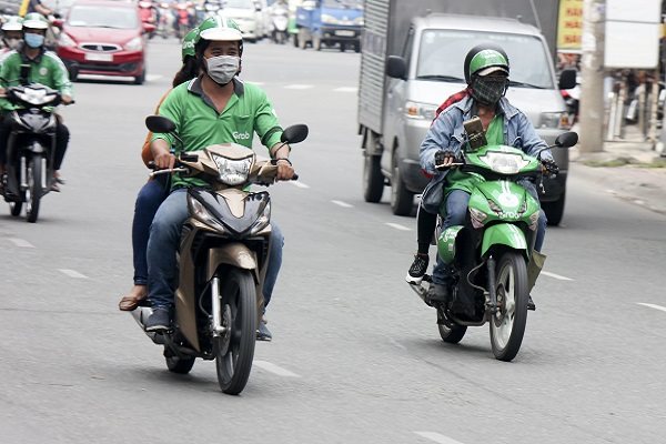 Để tài xế chờ, khách hàng của Grab sẽ bị thu phí