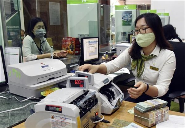 Vietcombank: Tăng trưởng lợi nhuận song hành cùng nợ xấu